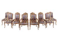 A Set of Twelve Louis XV Style Giltwood Dining Chairs