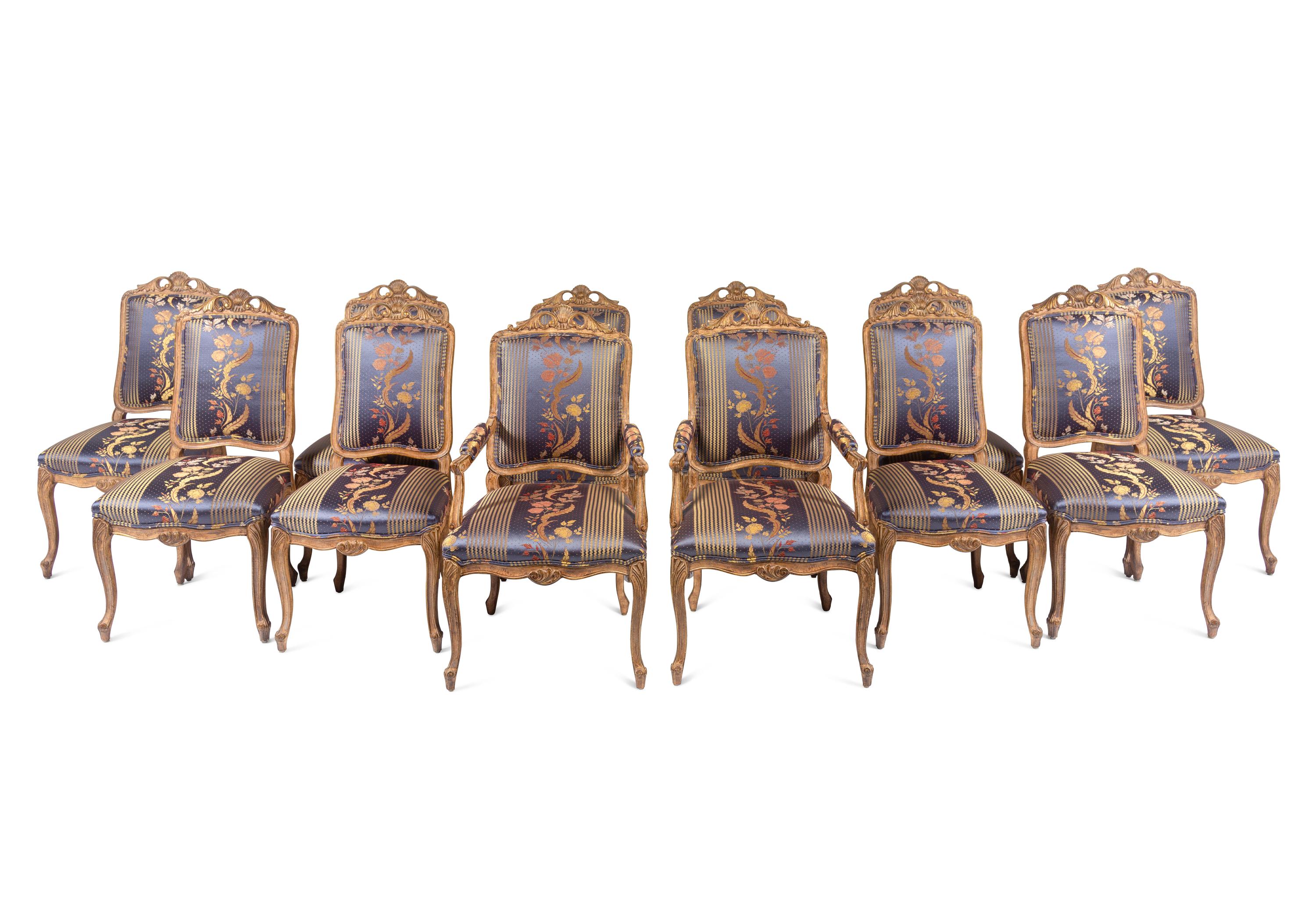 A Set of Twelve Louis XV Style Giltwood Dining Chairs