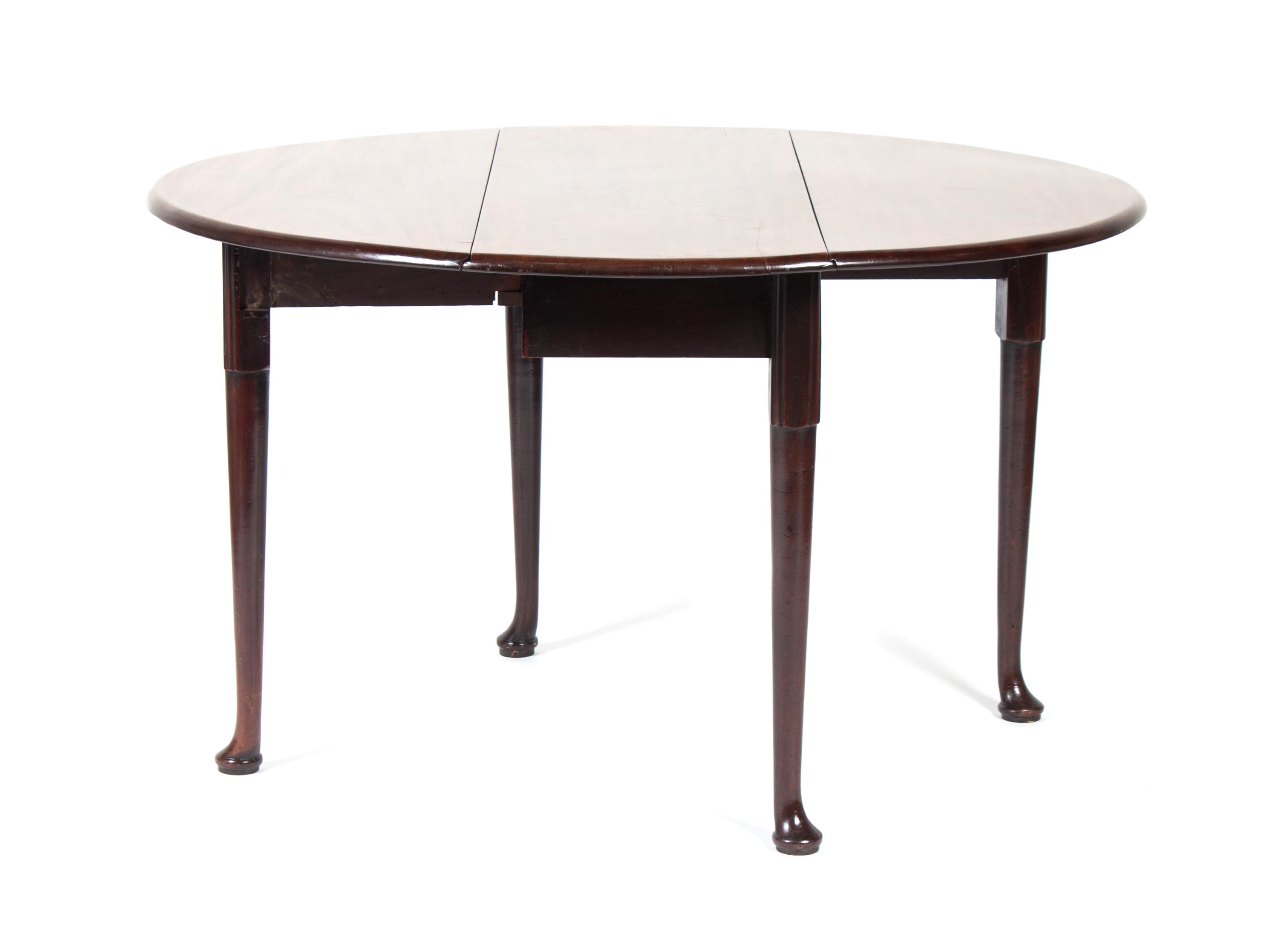 A Queen Anne Drop Leaf Mahogany Table Height 28 x width 17 (closed) x depth 42 inches.