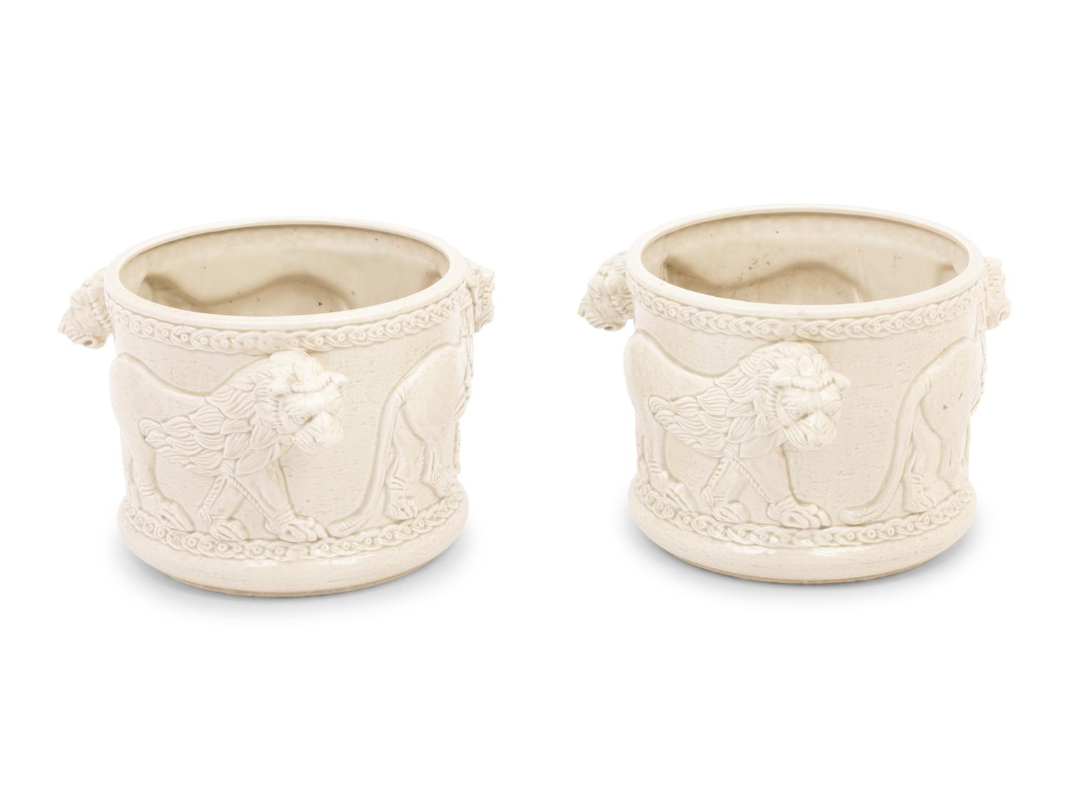 A Pair of Fitz and Floyd Glazed Ceramic Jardinières Modeled with Lions