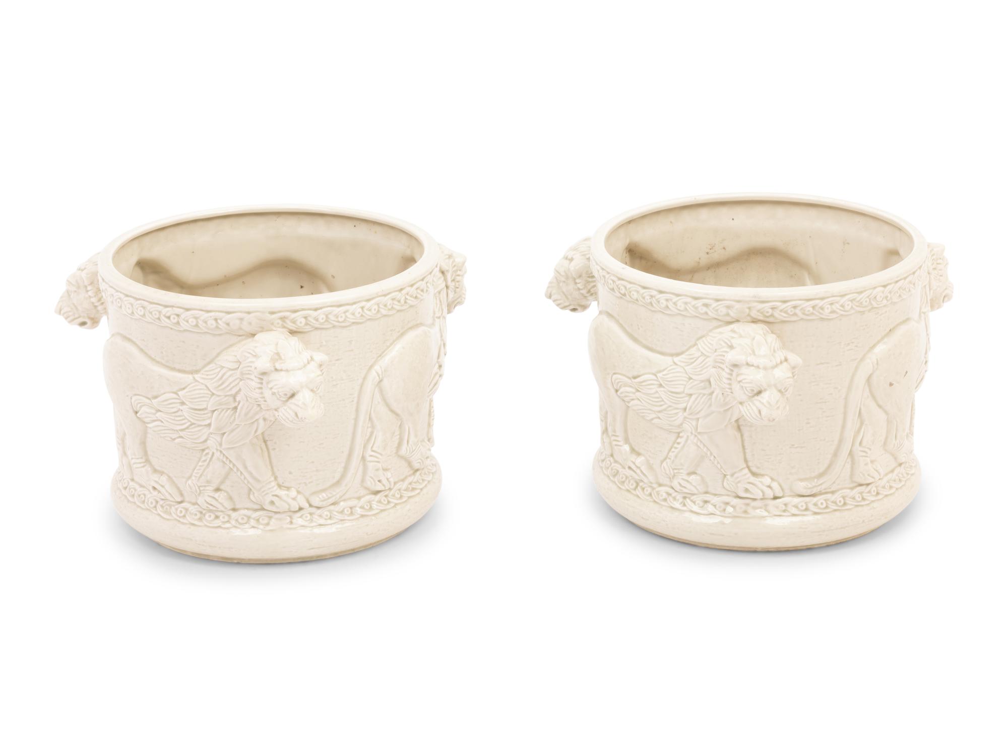 A Pair of Fitz and Floyd Glazed Ceramic Jardinières Modeled with Lions