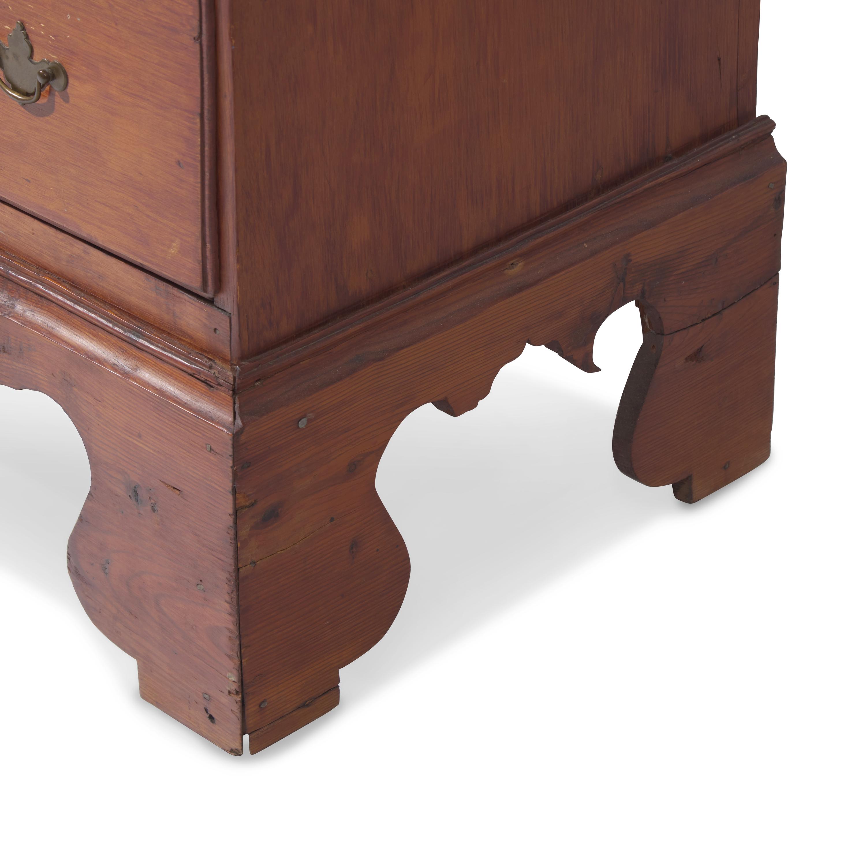 A Chippendale Red-Stained Pine Tall Chest
