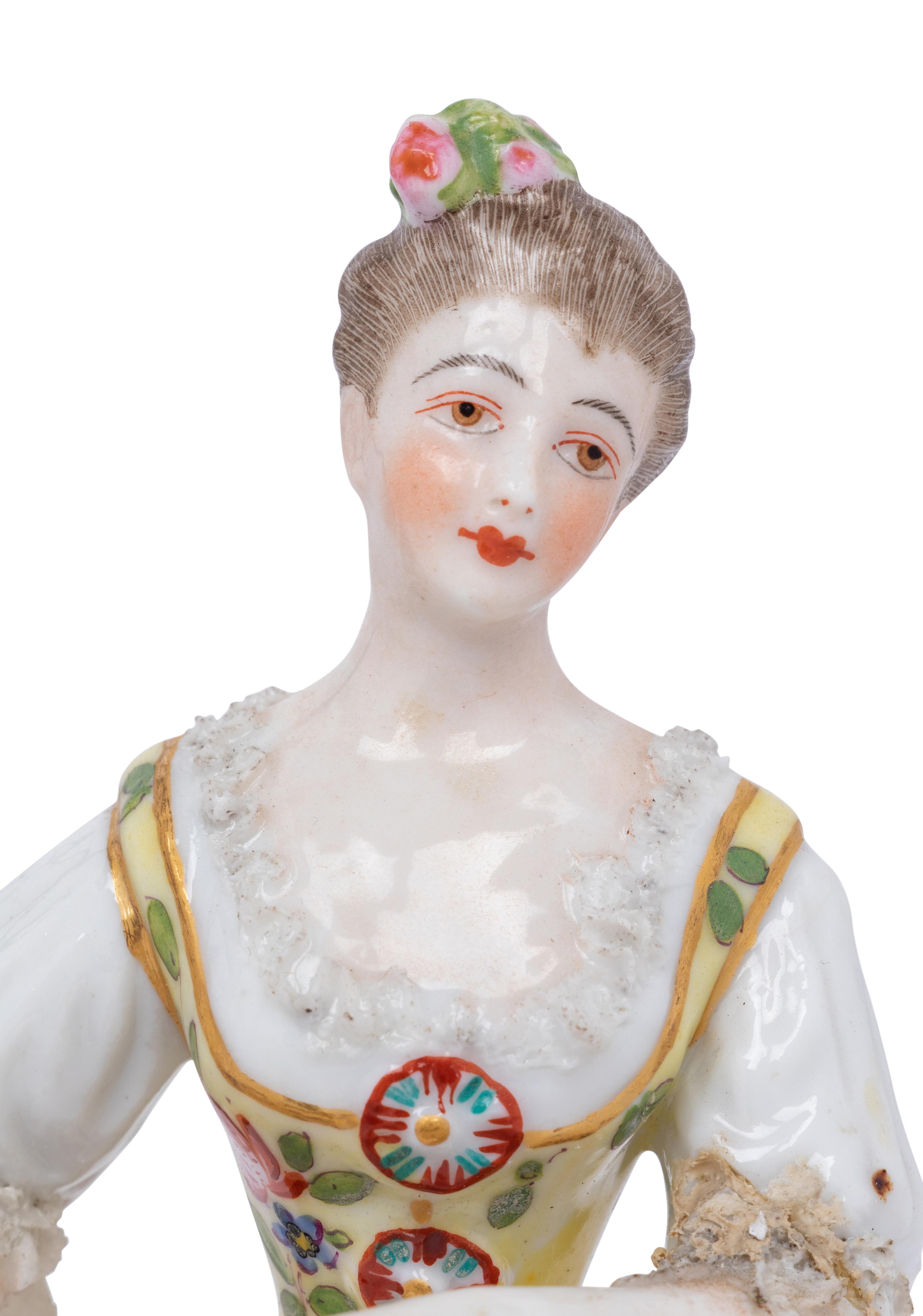 A Pair of Meissen Porcelain Figures and a German Porcelain Figure