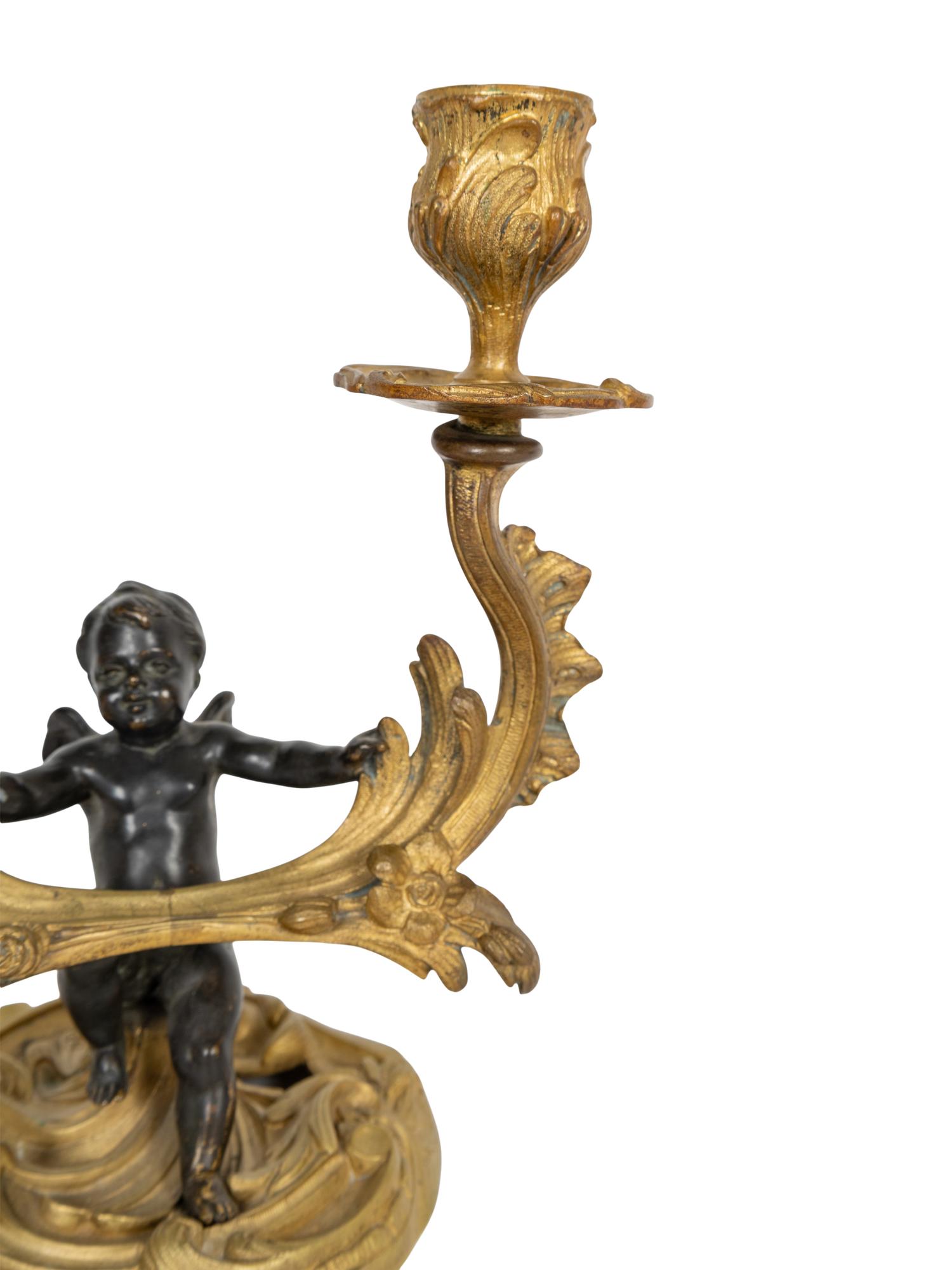 A Pair of Louis XV Style Gilt and Painted Bronze Two-Light Candelabra