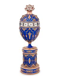 A Gold, Enamel and Diamond Inset Egg-Form Annular Clock