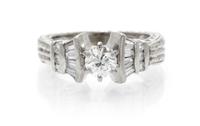 A 14 Karat White Gold and Diamond Ring, 4.10 dwts.