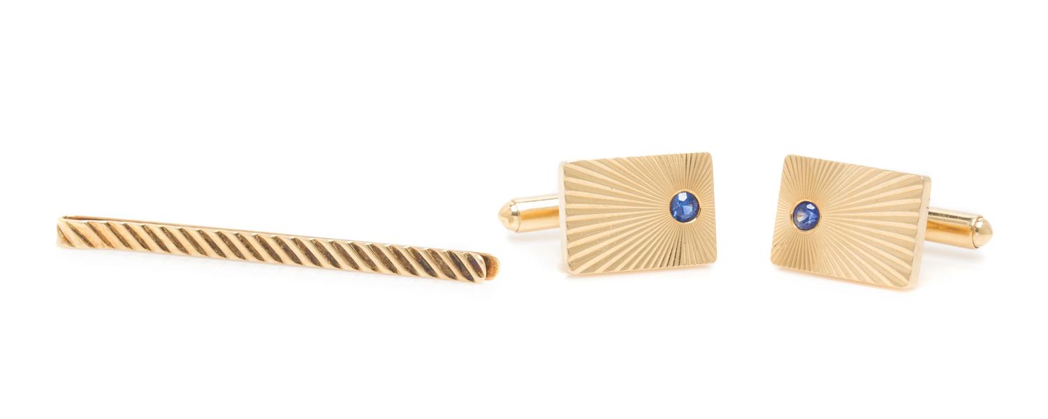 A Collection of 14 Karat Yellow Gold and Sapphire Cufflinks and Tie Bar, Tiffany & Co., 11.00 dwts.