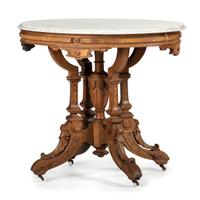 A Victorian Walnut Table with Marble Top