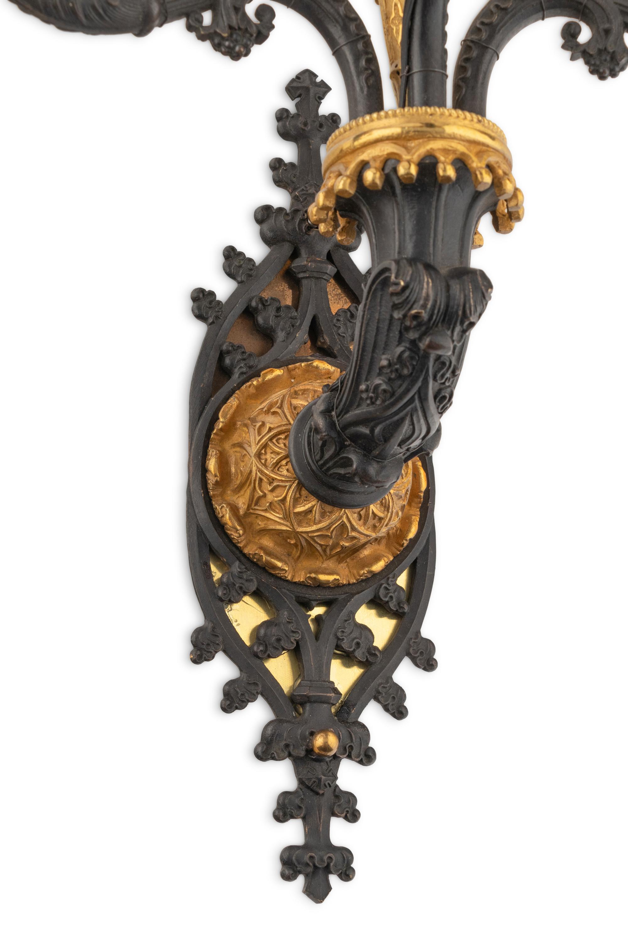 A Pair of Charles X Gilt and Patinated Bronze Four-Light Sconces