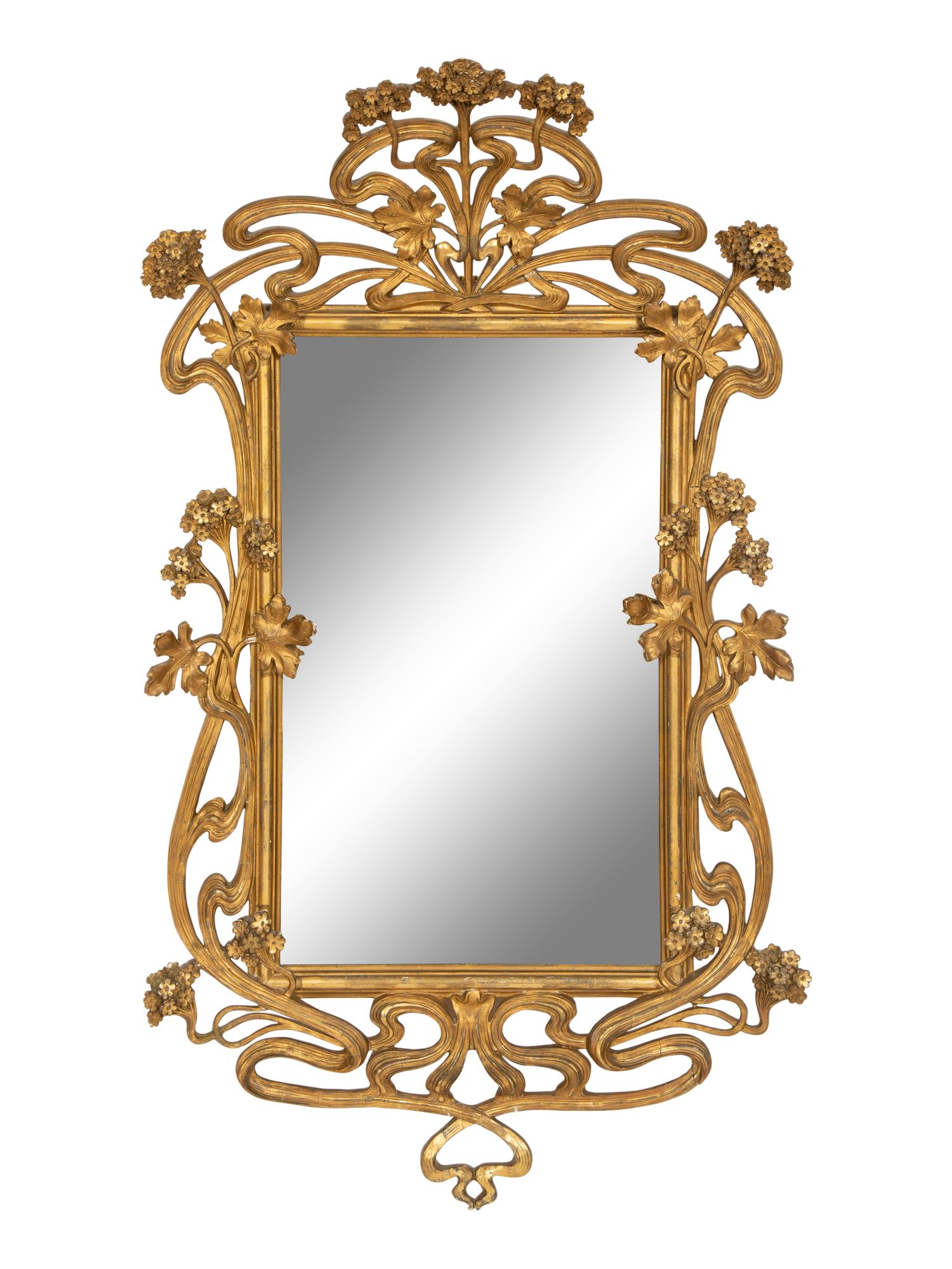 A Continental Art Nouveau Giltwood Mirror