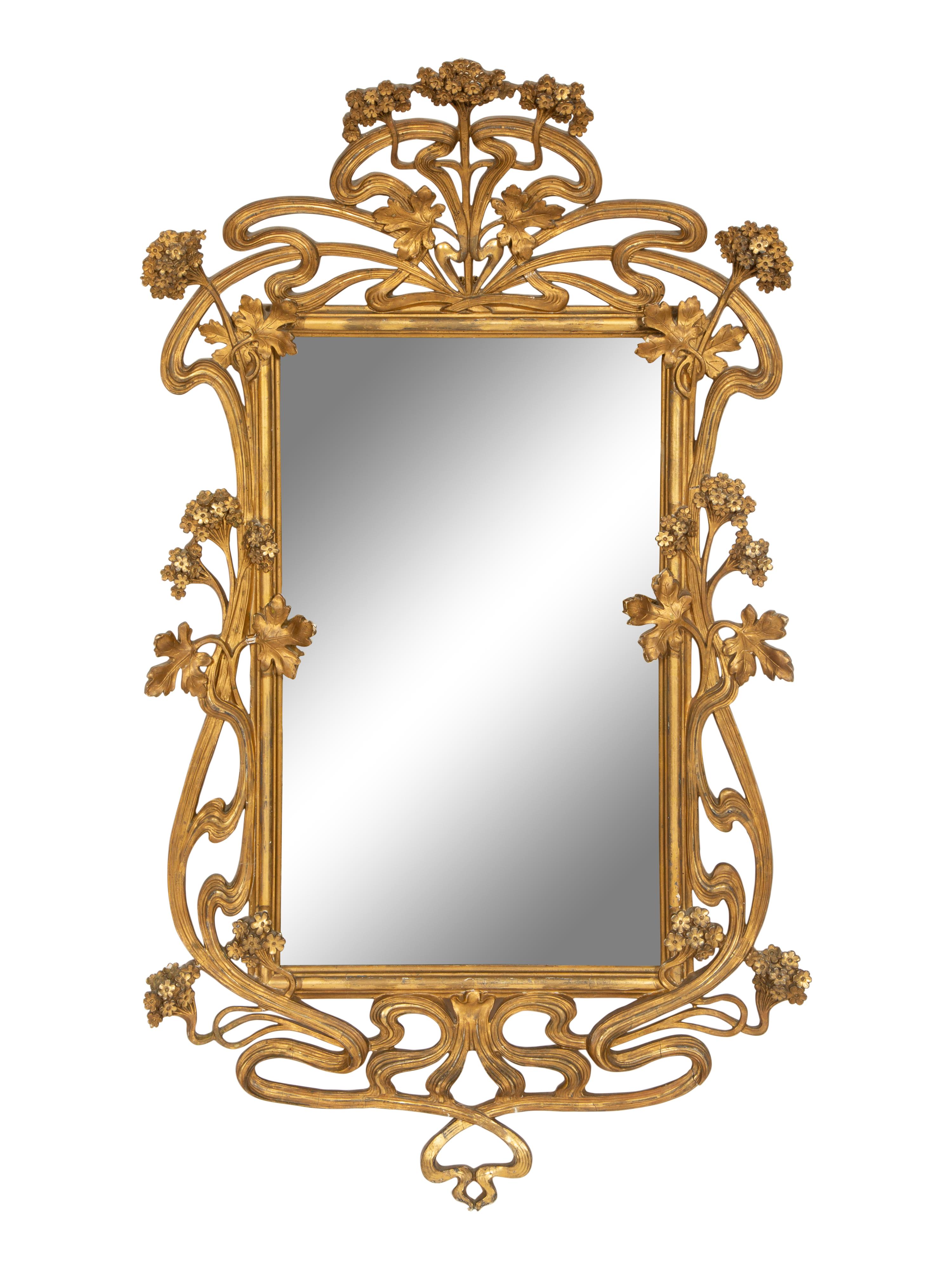A Continental Art Nouveau Giltwood Mirror