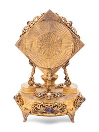 A Neoclassical Style Lapis Lazuli Inset Gilt Metal Mantel Clock