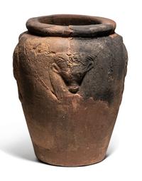 An Egyptian Pottery Jar with Head of Hathor