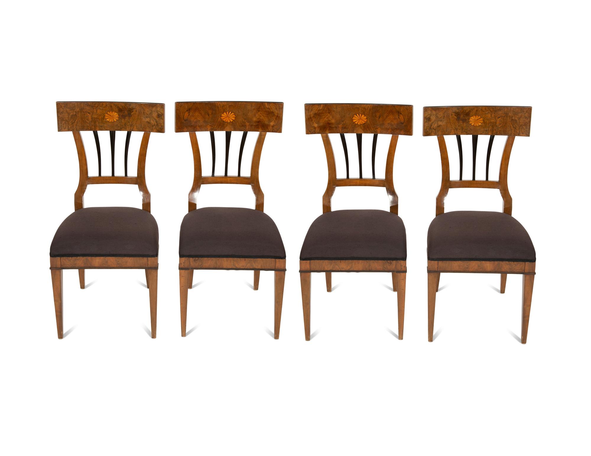 A Set of Four Biedermeier Fruitwood Inlaid Walnut Dining Chairs