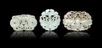 Three Pale Celadon Jade 'Butterfly' Pendants