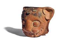 A Maya Red-Ware Incensario Fragment with the Head of a Jaguar