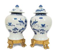 A Pair of Gilt Bronze Mounted Chinese Porcelain Jars