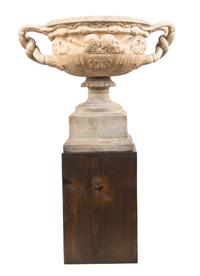 A Neoclassical Style Terracotta Urn, after the Warwick Vase, Width over handles 24 1/2 inches.