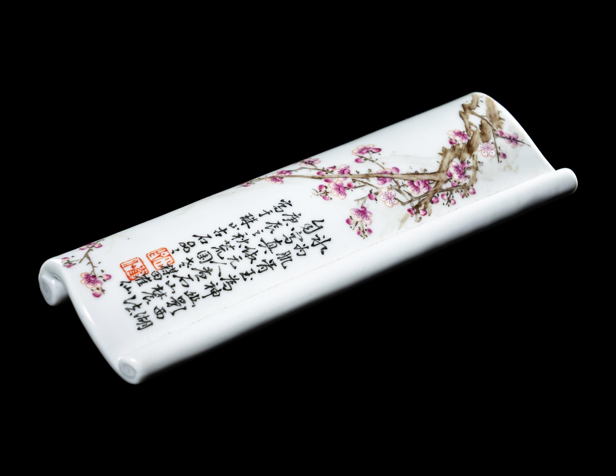 A Famille Rose Porcelain Scroll-Form Wrist Rest