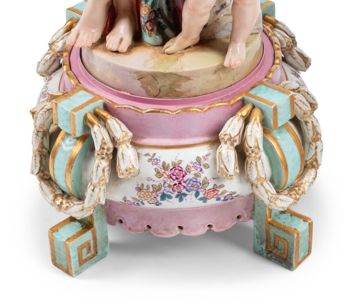 A Pair of Large German Porcelain Figural Six-Light Candelabra