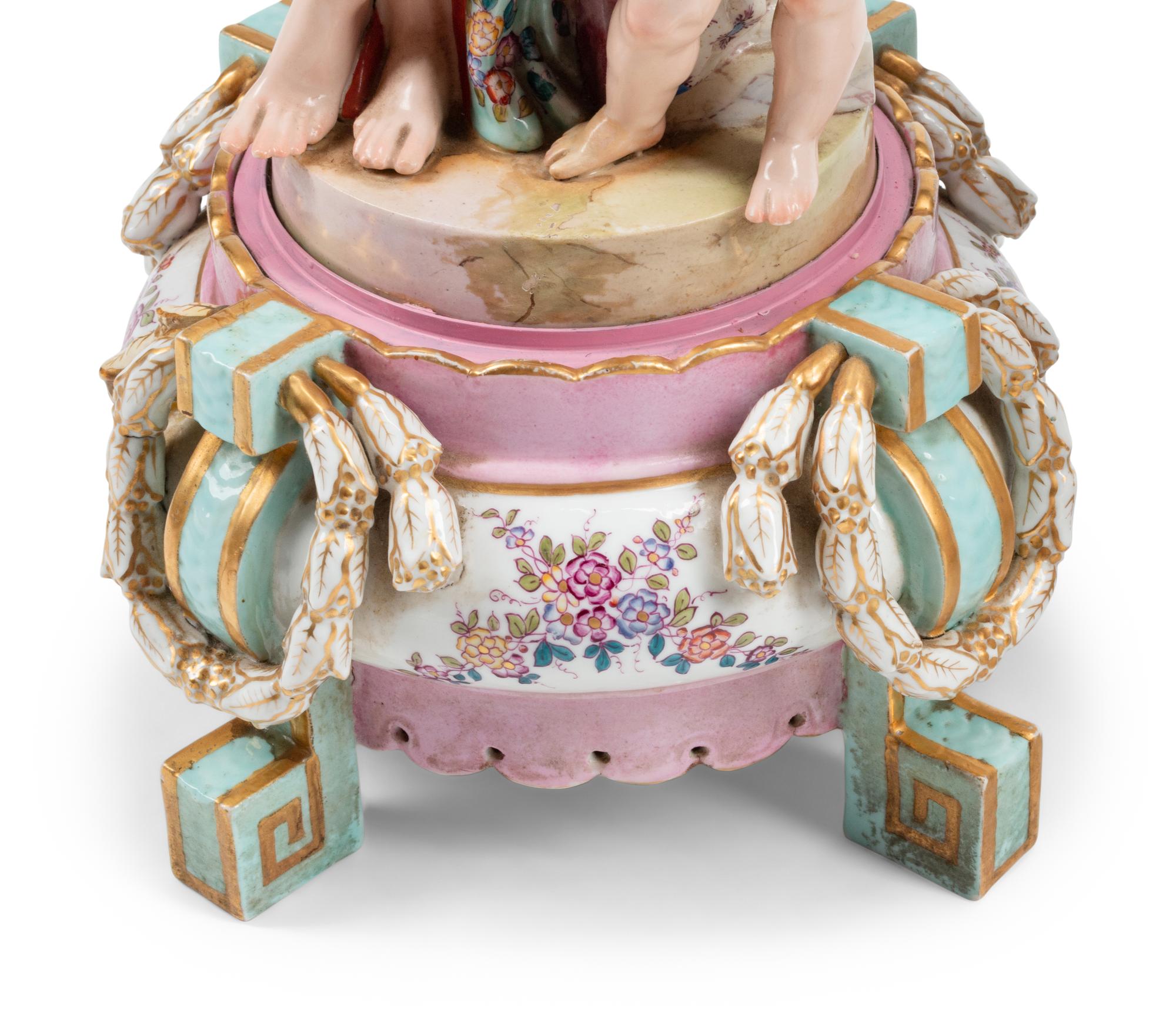 A Pair of Large German Porcelain Figural Six-Light Candelabra