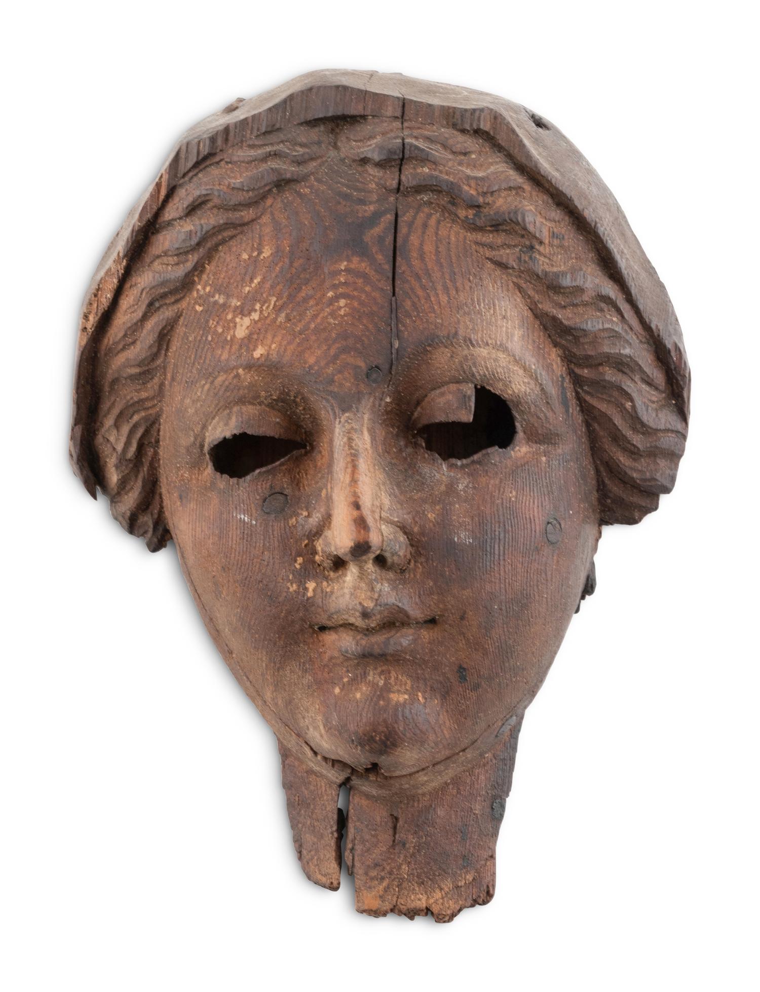 A Continental Carved Pine Maiden's Mask
