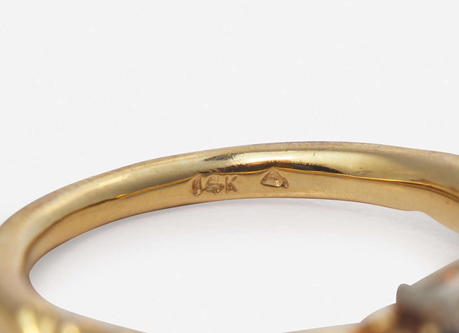 A Collection of Assorted Gold and Gemstone Rings