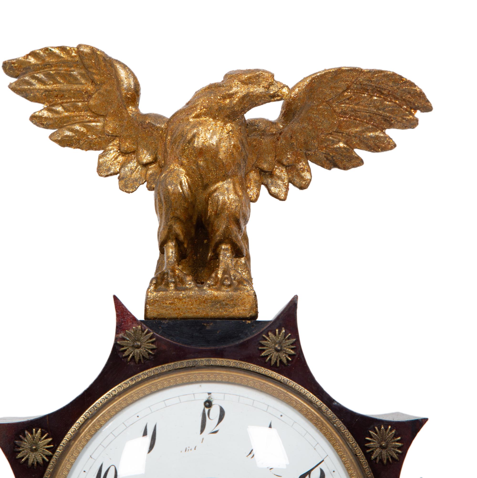 An Austrian Ebonized and Burlwood Mantel Clock with Gilt Metal and Giltwood Mounts