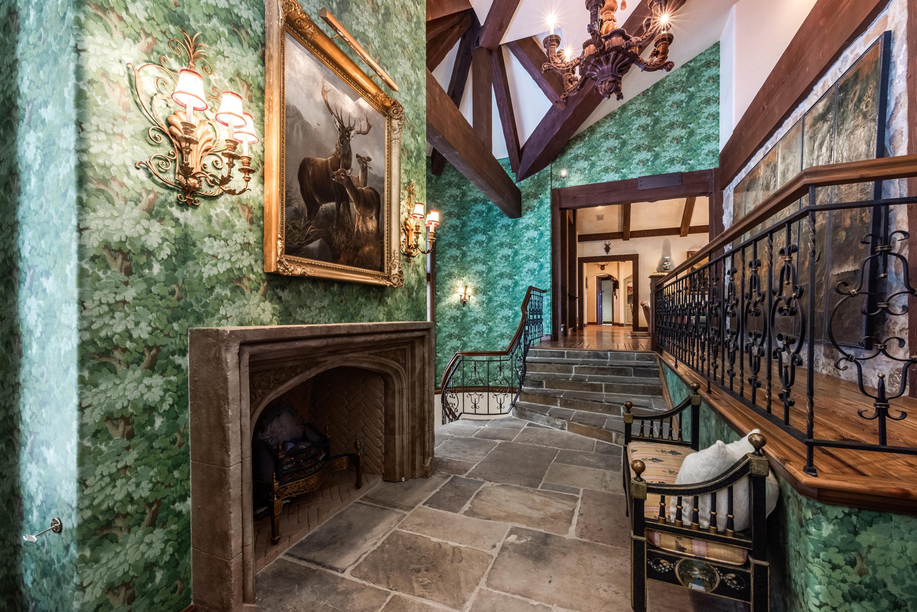 A Spanish Walnut and Brass Mounted Mirror
