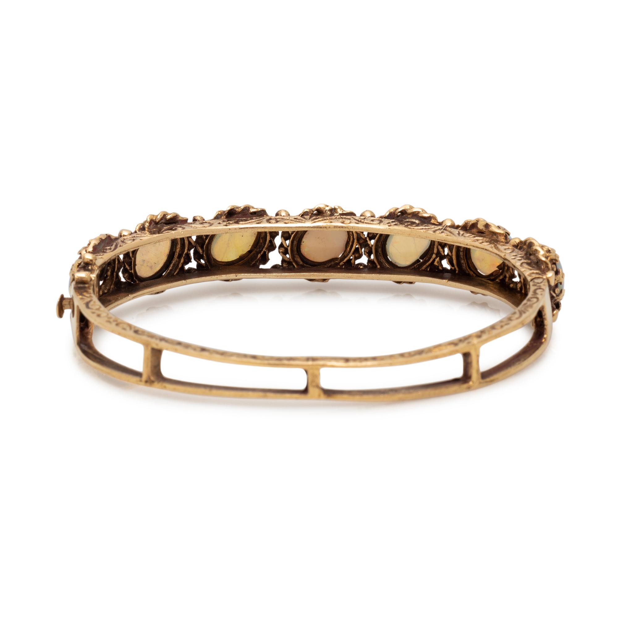 YELLOW GOLD AND OPAL BANGLE BRACELET
