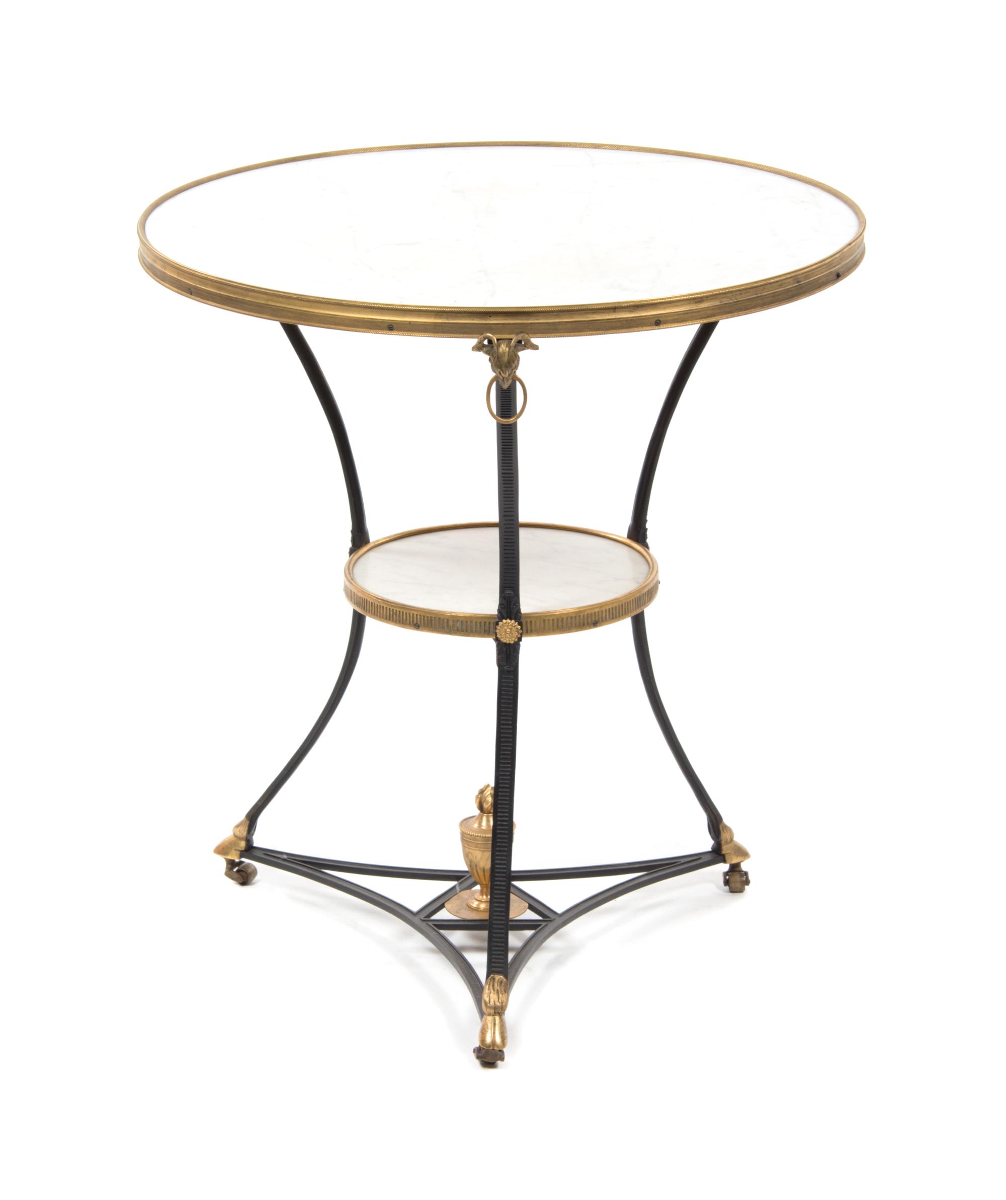 A Continental Gilt and Patinated Bronze Gueridon, Height 28 1/4 x diameter 26 inches.