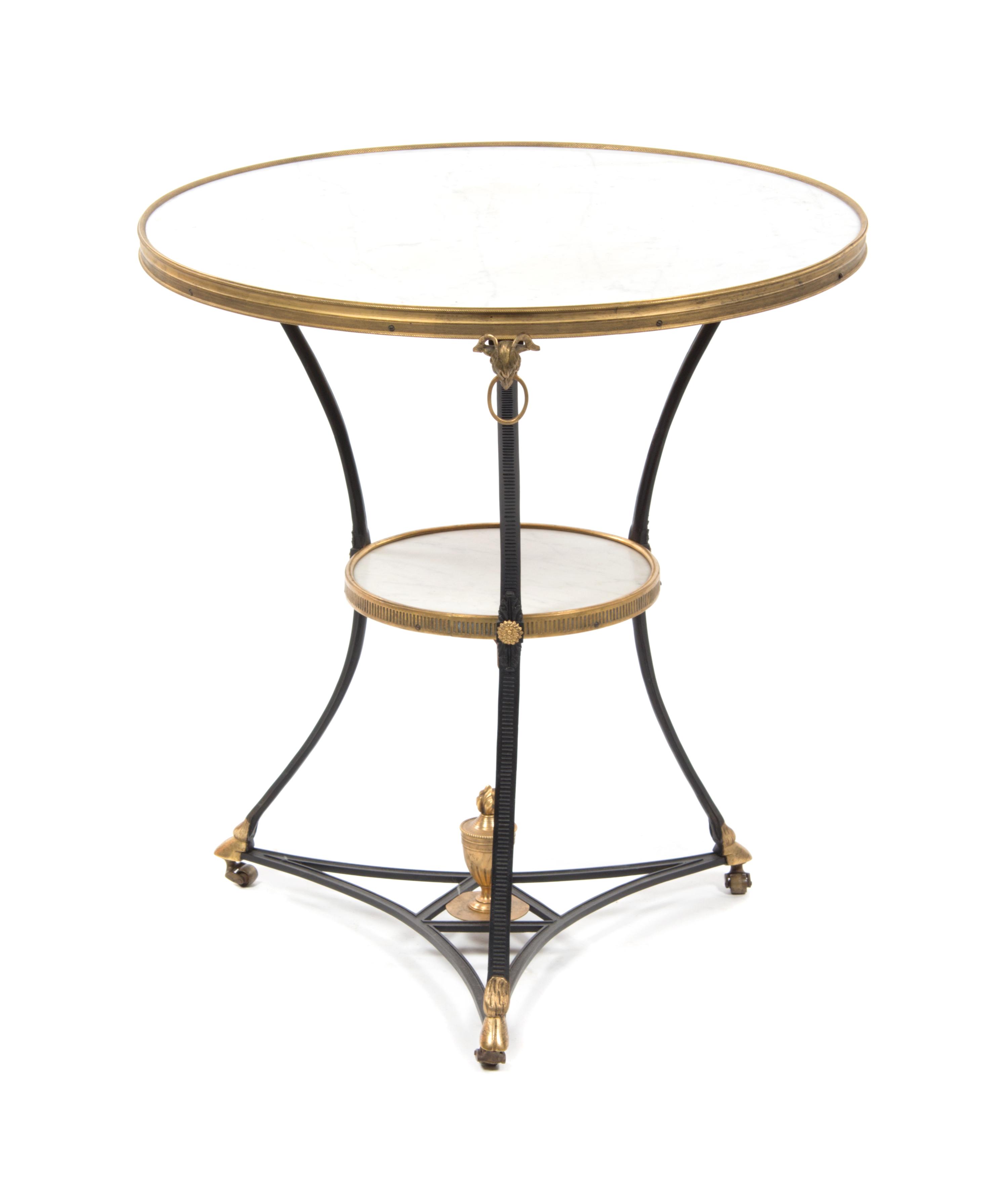 A Continental Gilt and Patinated Bronze Gueridon, Height 28 1/4 x diameter 26 inches.