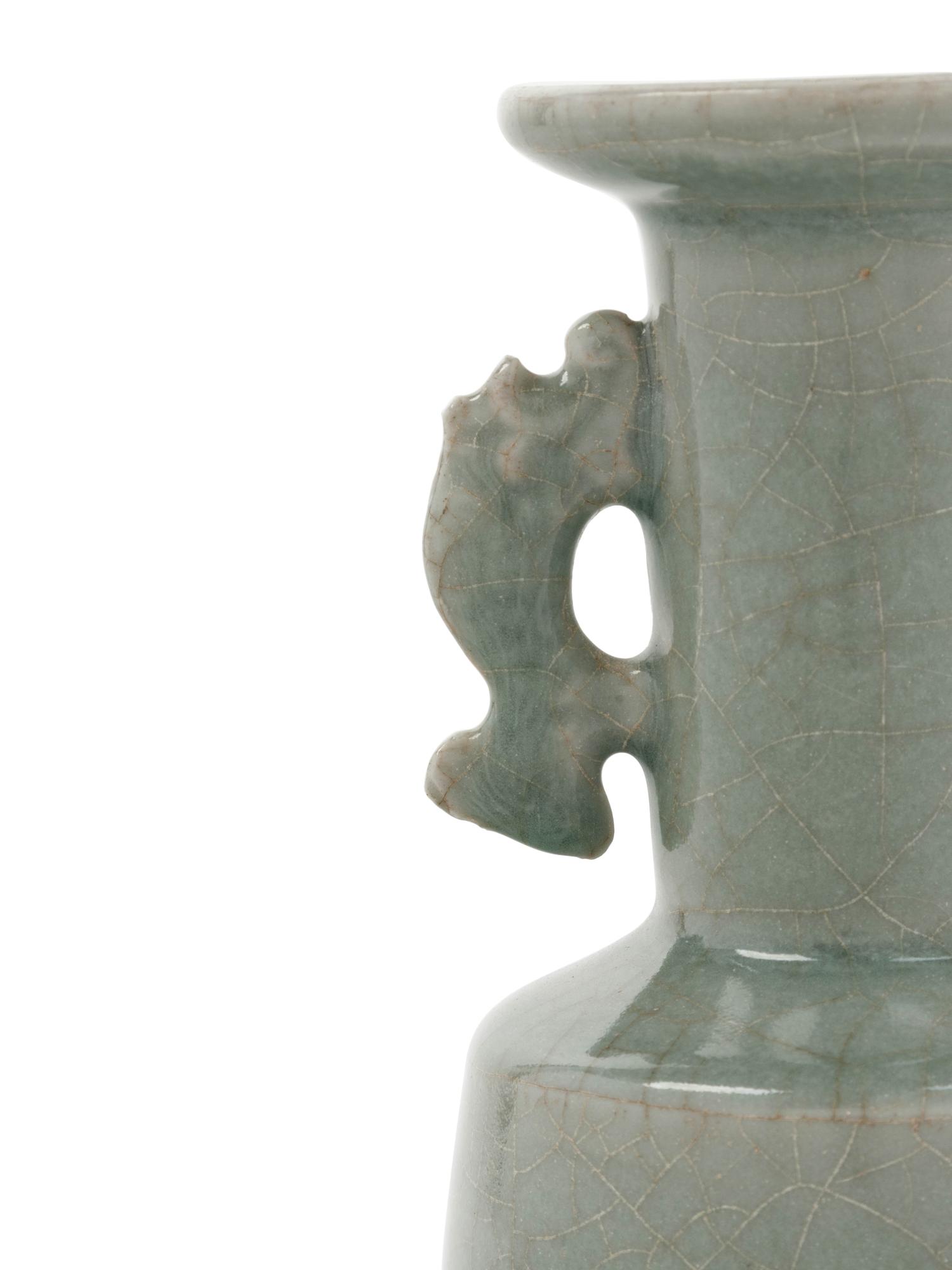A Chinese Celadon Glazed Porcelain Double Handled Vase