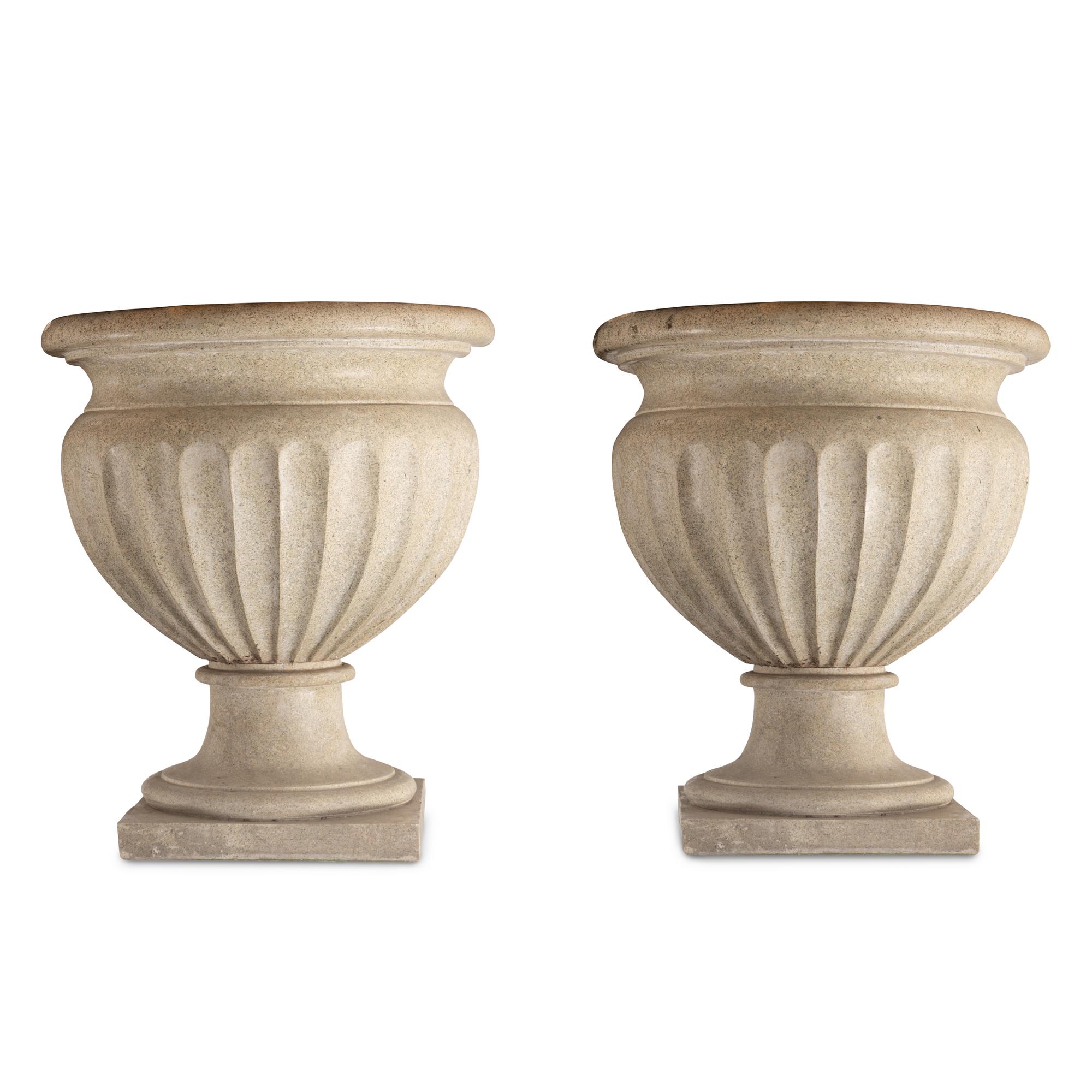 A Pair of Granite Garden Urns