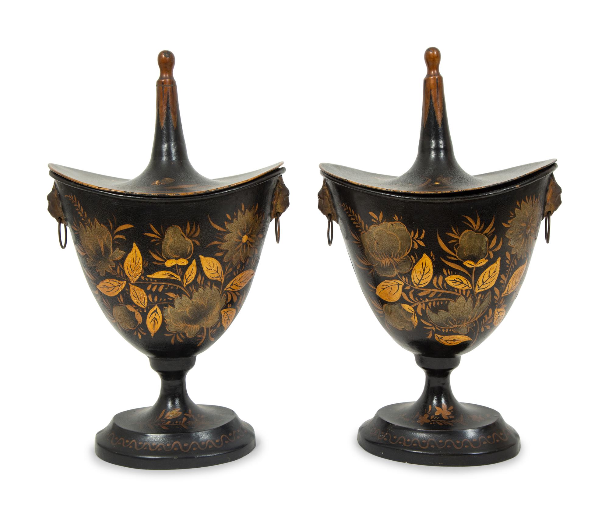 A Pair of Regency Style Black and Gilt Decorated Tole Covered Urns