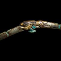 A Chinese Gilt, Silvered and Turquoise Inlaid 'Rabbit' Gold Belt Hook, Warring States Period 戰國 鎏金銅錯銀嵌松石雙獸首奔兔帶鉤