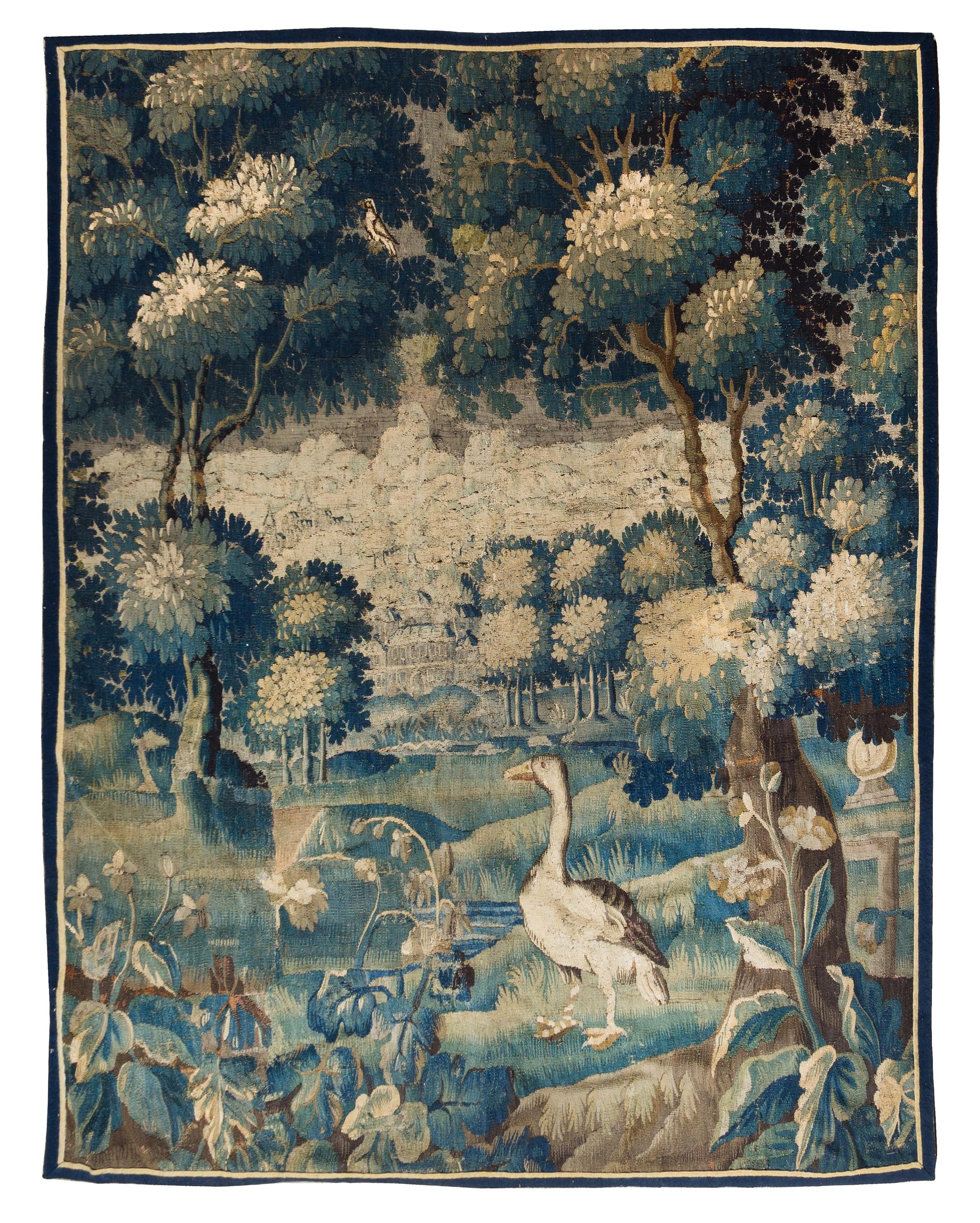 A Flemish Wool Verdure Tapestry 7 feet x 5 feet 9 inches. — 17TH/18TH CENTURY