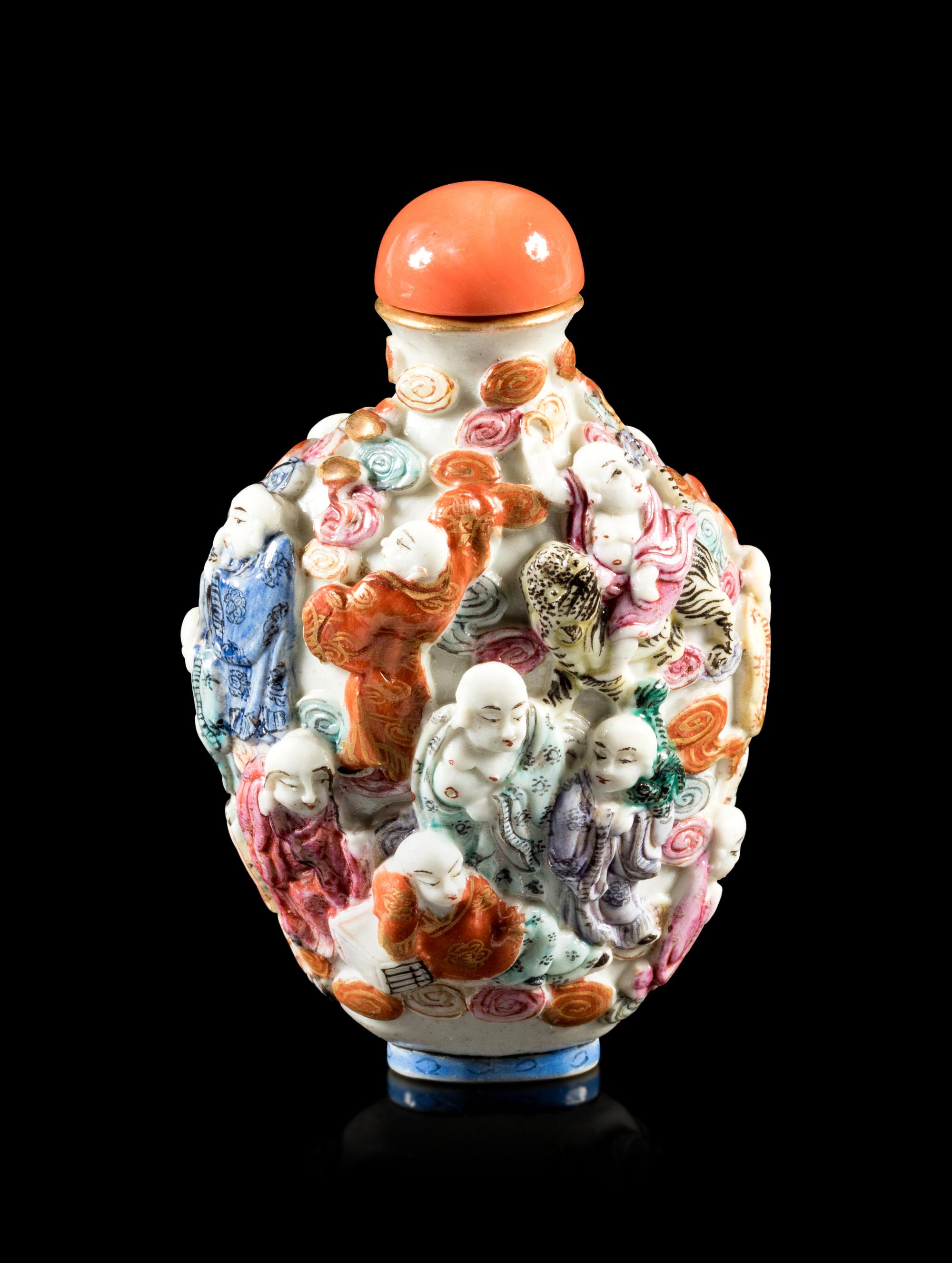 A Famille Rose Molded Porcelain 'Luohan' Snuff Bottle