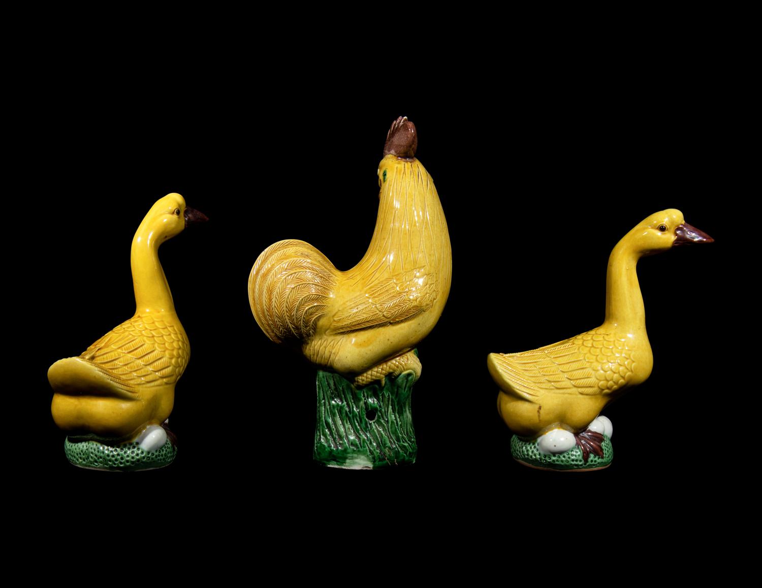 Three Chinese Yellow and Green Glazed Porcelain Birds