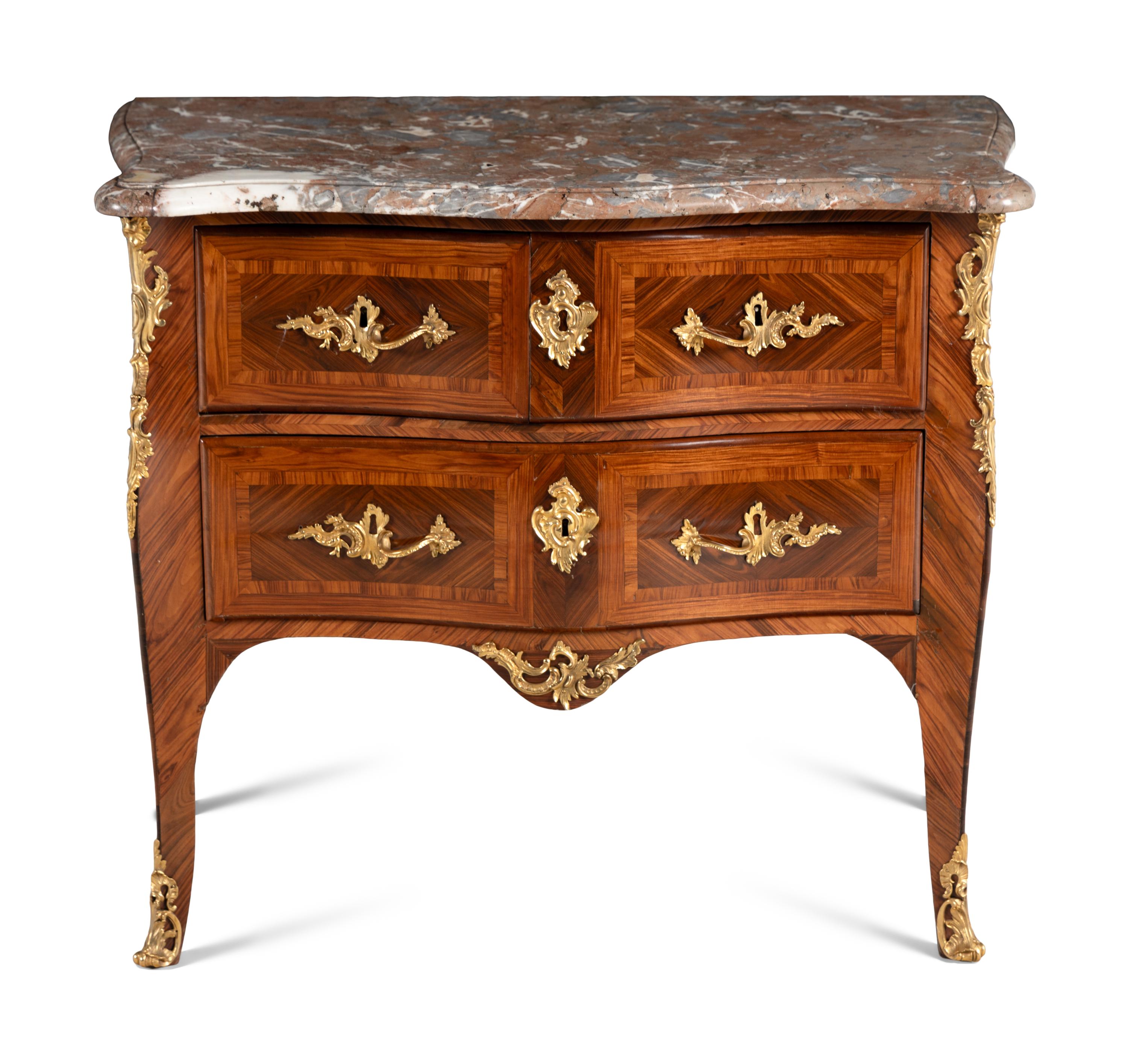A Louis XV Gilt Bronze Mounted Kingwood and Tulipwood Marble-Top Commode