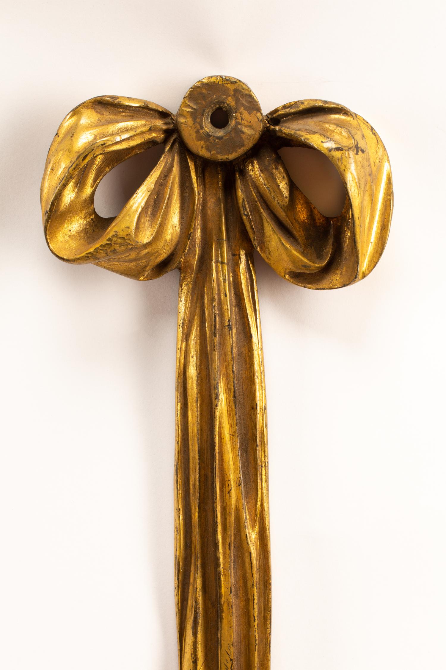 A Pair of Régence Style Gilt Bronze Seven-Light Sconces