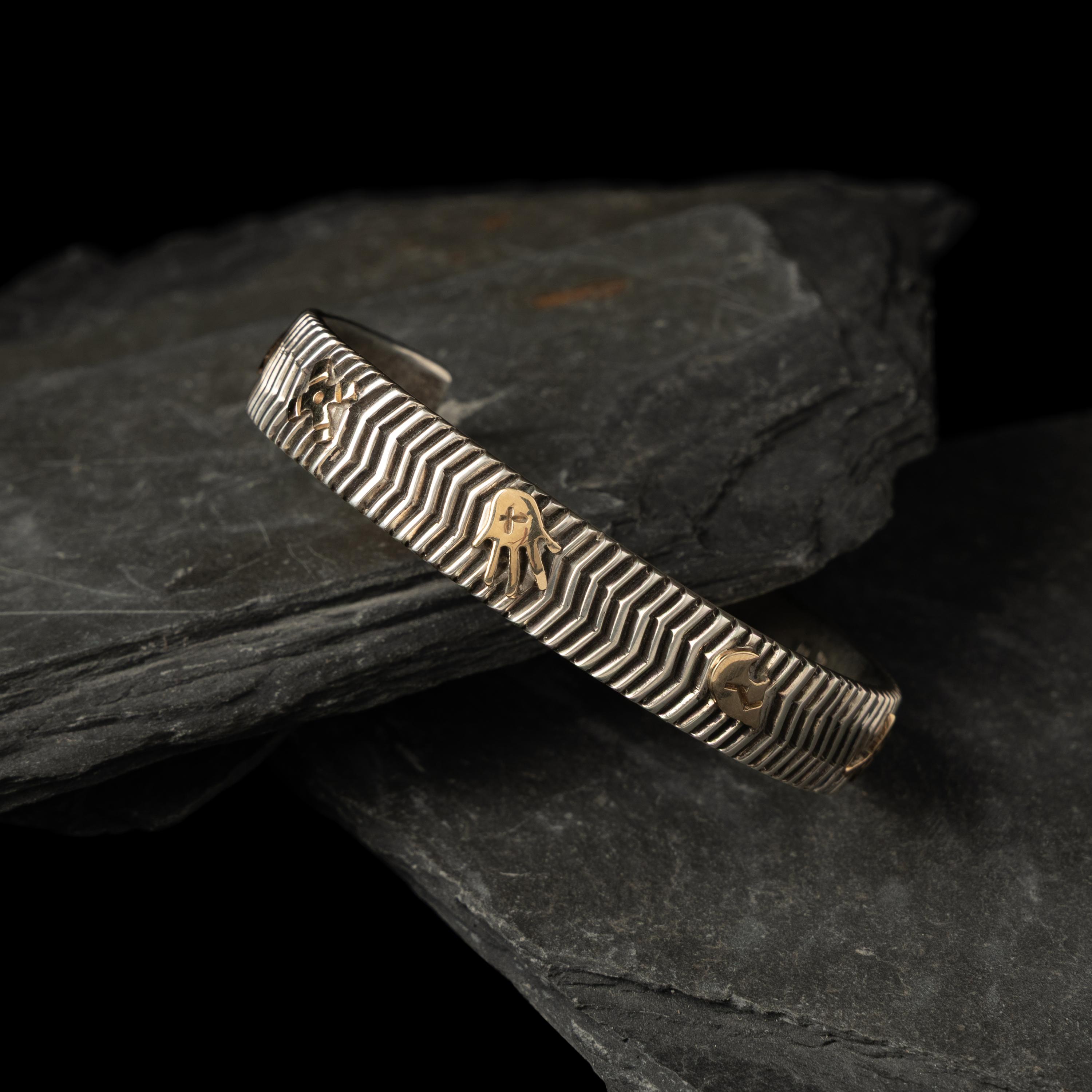 Kee Yazzie (Diné, b. 1969) — Sterling Silver and 14K Gold Petroglyph Cuff Bracelet