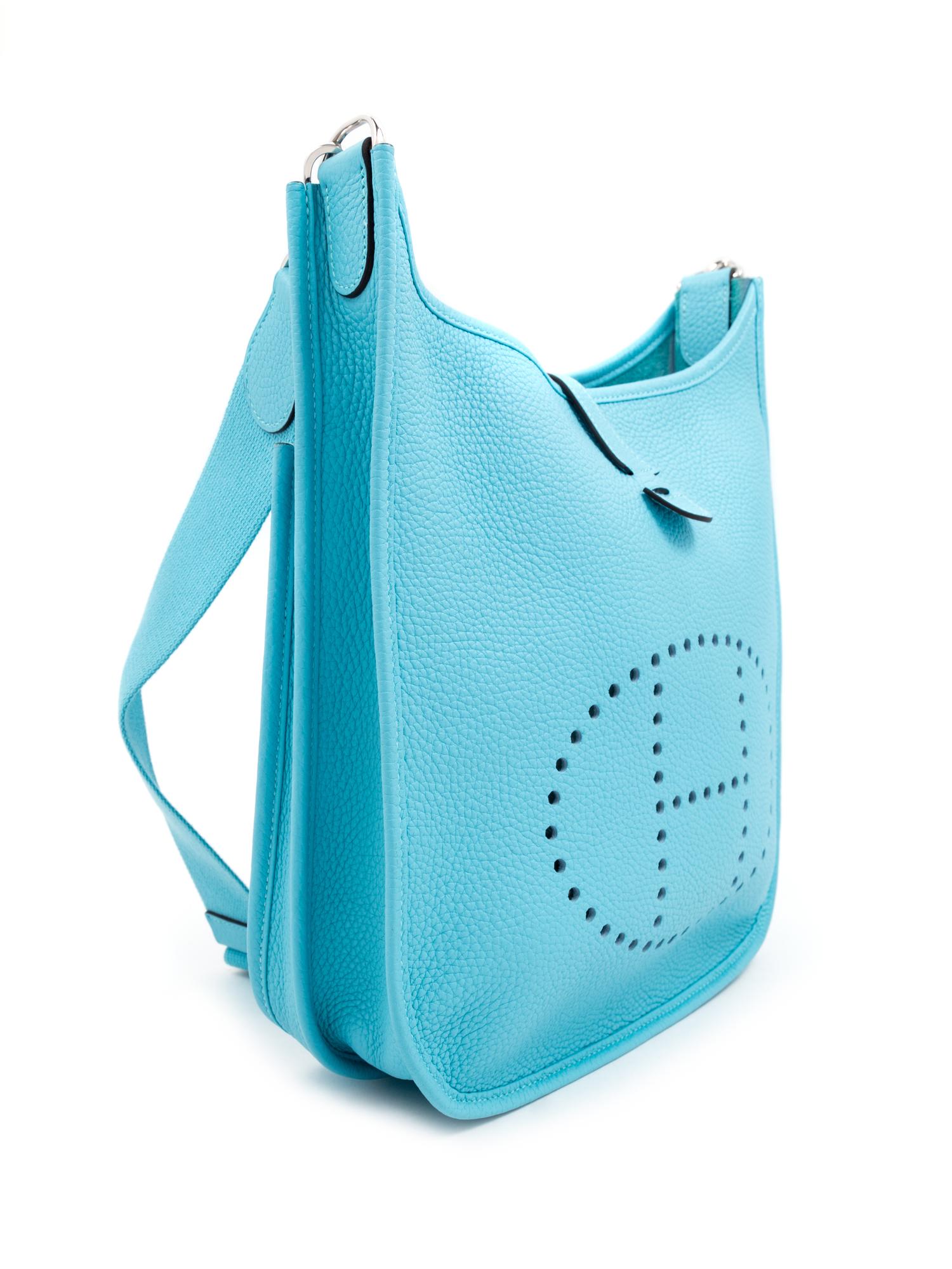 An Hermès Turquoise Evelyne III PM Bag, 12.75" H x 11.25" W x 3.25" D; Strap drop: 24.5"- 27.75".