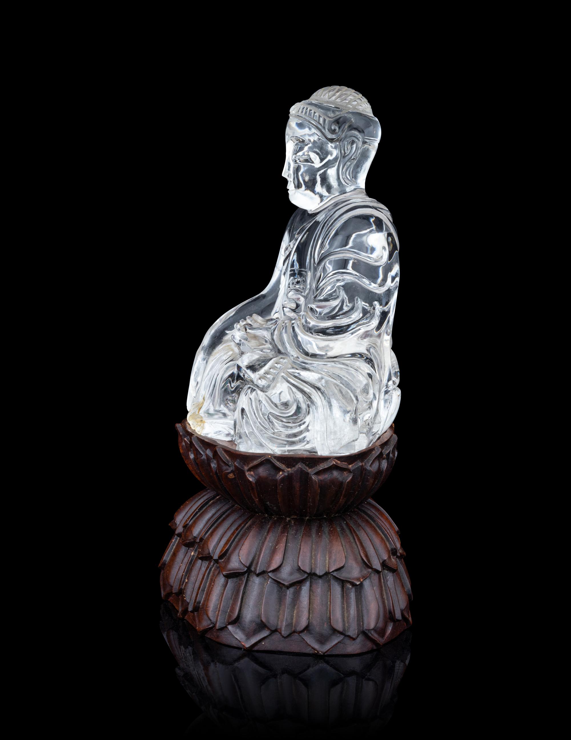 A Carved Rock Crystal Figure of Buddha