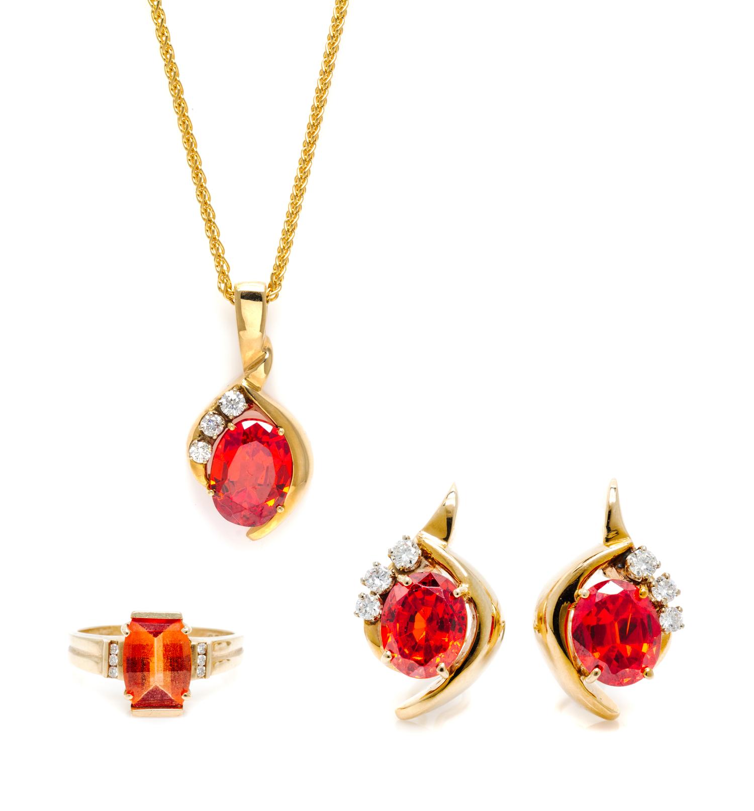 A 14 Karat Yellow Gold and Synthetic Orange Sapphire Demi Parure, 35.90 dwts.