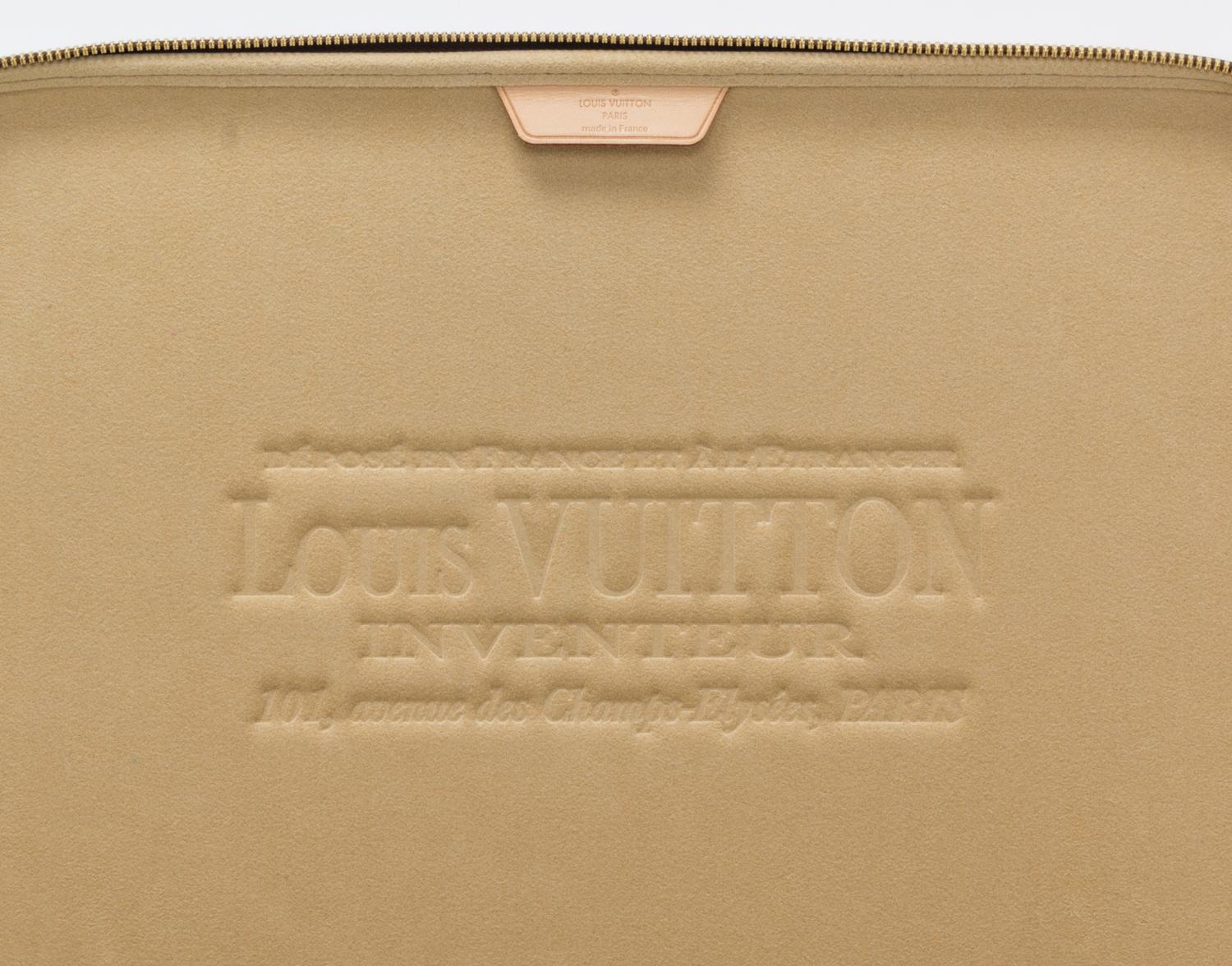 A Louis Vuitton Monogram Canvas Computer Case, 14" x 11" x 1".