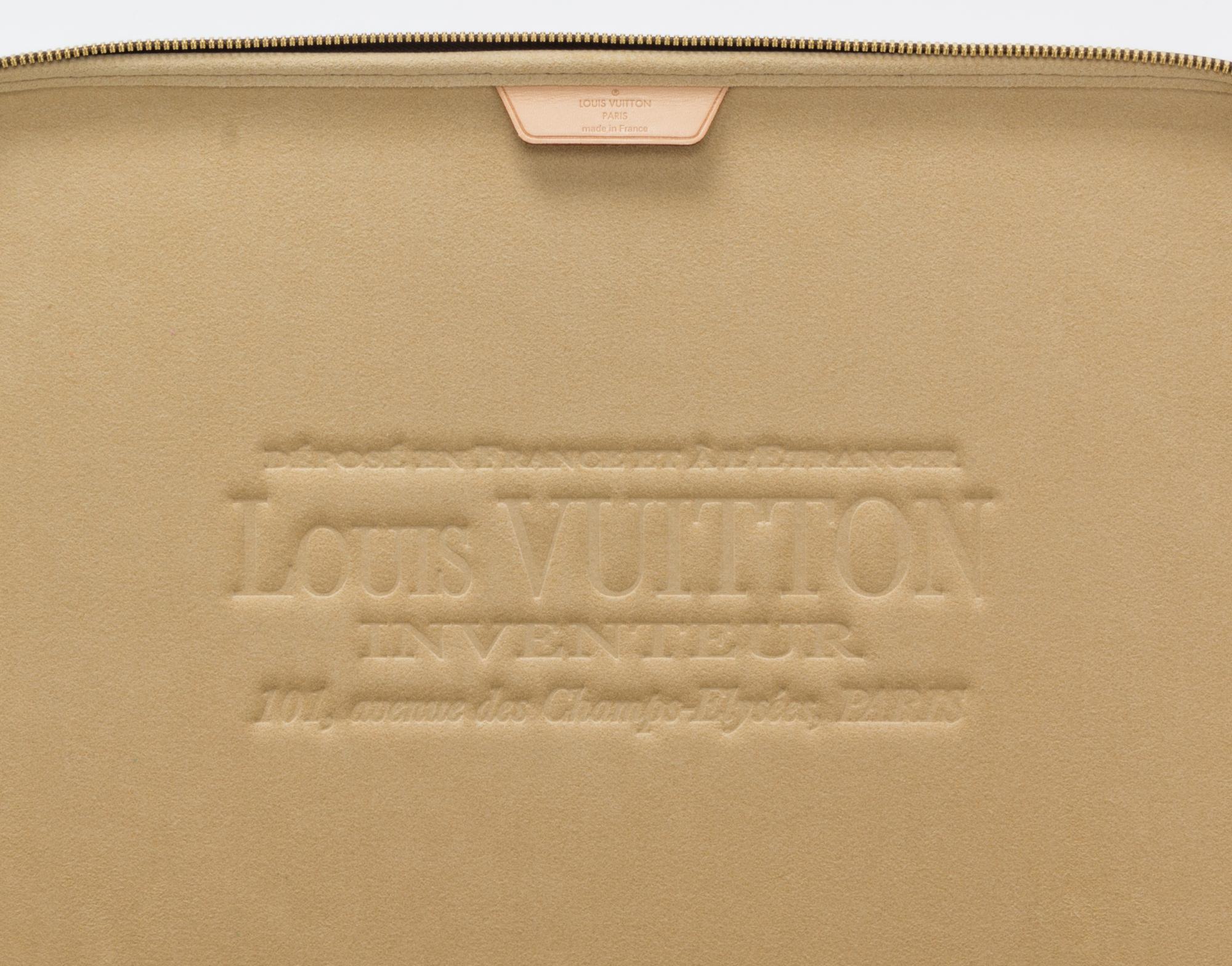 A Louis Vuitton Monogram Canvas Computer Case, 14" x 11" x 1".