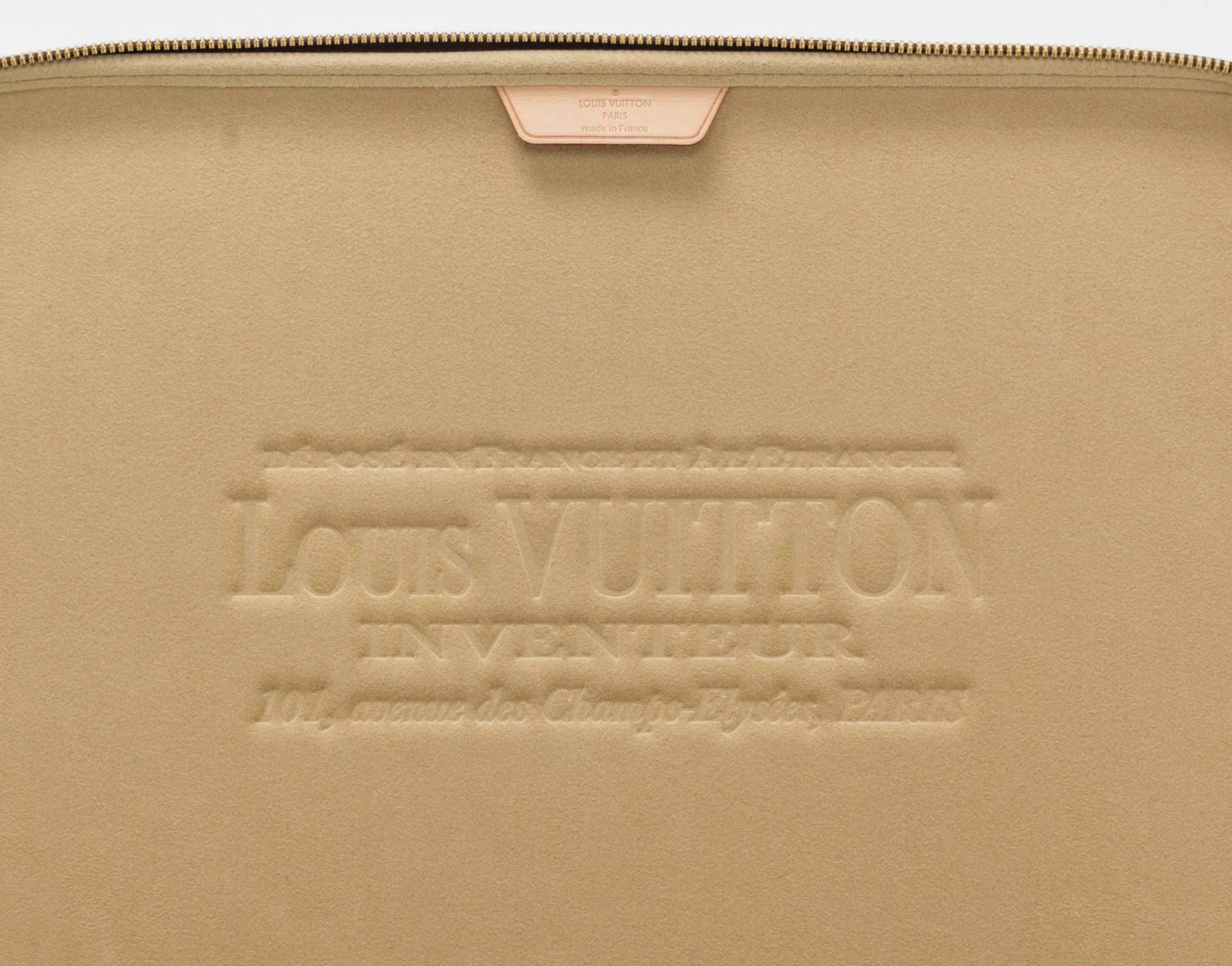 A Louis Vuitton Monogram Canvas Computer Case, 14" x 11" x 1".