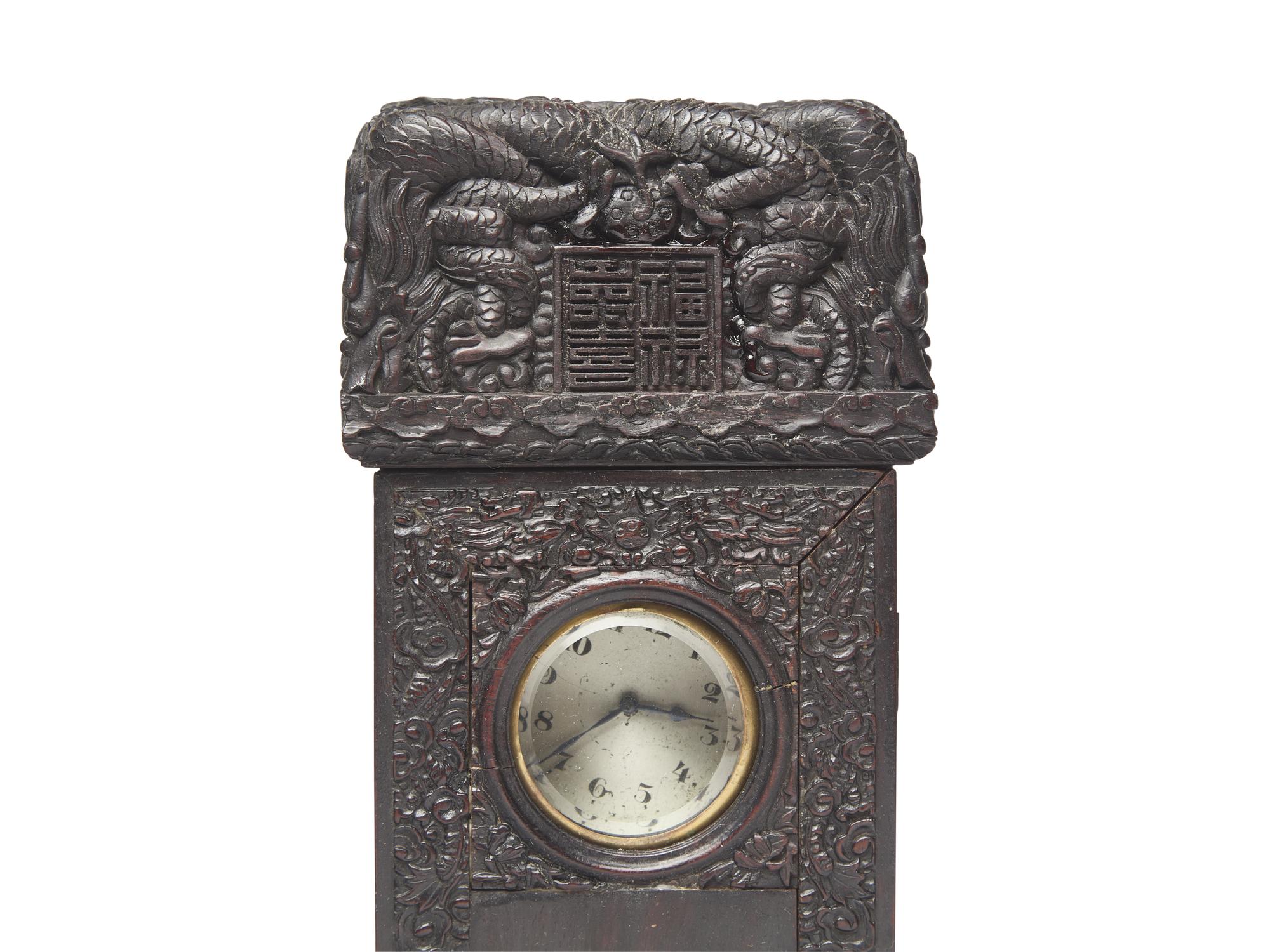 A Chinese Hardwood Stele Form Table Clock