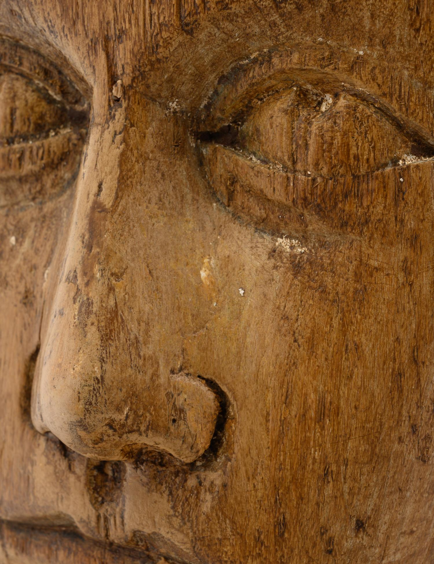 A Carved Wood Mannequin Head